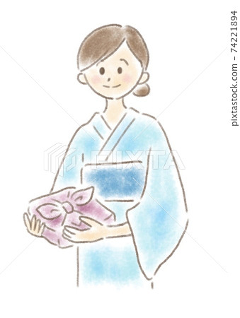 Illustration of a woman in a yukata with a gift 74221894