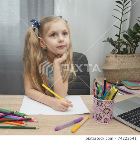 Cute girl doing homework Cute girl doing homework 74222541