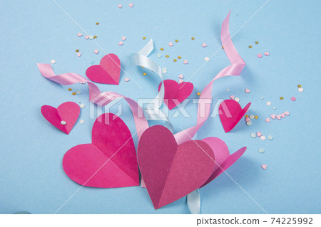 Abstract Background with Paper Hearts, ribbons for Valentine`s Day. Blue Love and Feeling Background for poster, banner, post, card Abstract Background with Paper Hearts, ribbons for Valentine`s Day. Blue Love and Feeling Background for poster, banner, post, card 74225992