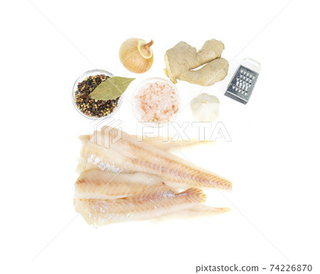 Frozen pollock fillet. Cooking fish dishes. Studio Photo Frozen pollock fillet. Cooking fish dishes. Studio Photo 74226870