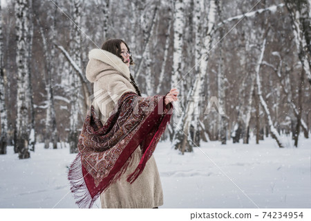 Sad woman in cold winter day 74234954