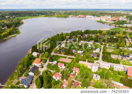 Aerial panoramic view of city Inkeroinen at river Kymijoki, Finland. Aerial panoramic view of city Inkeroinen at river Kymijoki, Finland. 74238363