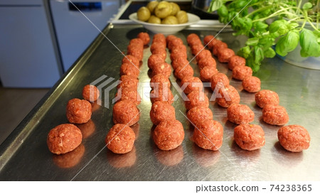 Homemade meatballs on the kitchen counter Homemade meatballs on the kitchen counter 74238365