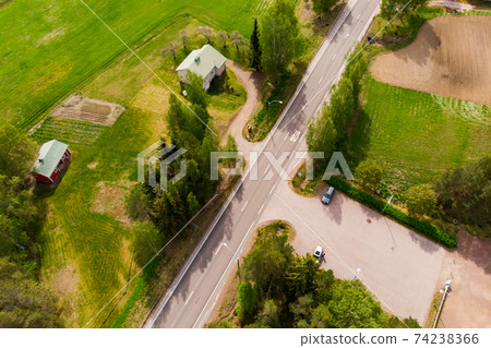 Aerial panoramic view of asphalt road Finland. 74238366