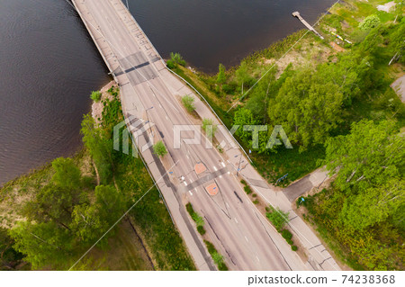 Aerial panoramic view of bridge in city Inkeroinen at river Kymijoki, Finland. 74238368
