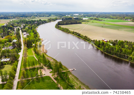 Aerial panoramic view of city Inkeroinen at river Kymijoki, Finland. Aerial panoramic view of city Inkeroinen at river Kymijoki, Finland. 74238465