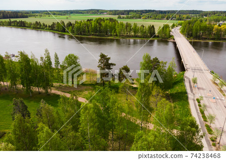 Aerial panoramic view of bridge in city Inkeroinen at river Kymijoki, Finland. Aerial panoramic view of bridge in city Inkeroinen at river Kymijoki, Finland. 74238468