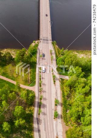 Aerial panoramic view of bridge in city Inkeroinen at river Kymijoki, Finland. 74238479