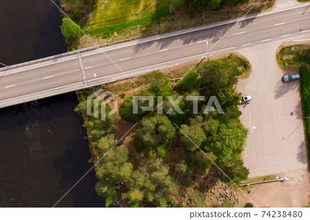 Aerial panoramic view of bridge in city Inkeroinen at river Kymijoki, Finland. Aerial panoramic view of bridge in city Inkeroinen at river Kymijoki, Finland. 74238480
