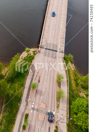 Aerial panoramic view of bridge in city Inkeroinen at river Kymijoki, Finland. Aerial panoramic view of bridge in city Inkeroinen at river Kymijoki, Finland. 74238485