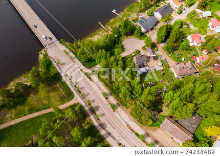 Aerial panoramic view of bridge in city Inkeroinen at river Kymijoki, Finland. Aerial panoramic view of bridge in city Inkeroinen at river Kymijoki, Finland. 74238489