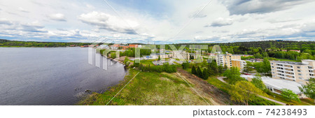 Aerial panoramic view of city Inkeroinen at river Kymijoki, Finland. Aerial panoramic view of city Inkeroinen at river Kymijoki, Finland. 74238493