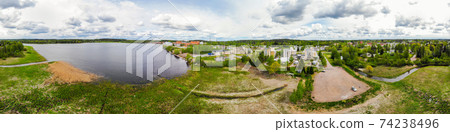 Aerial panoramic view of city Inkeroinen at river Kymijoki, Finland. Aerial panoramic view of city Inkeroinen at river Kymijoki, Finland. 74238496