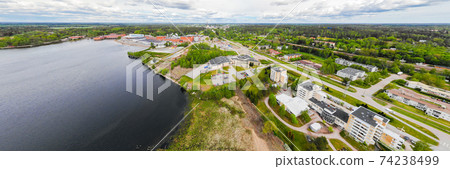 Aerial panoramic view of city Inkeroinen at river Kymijoki, Finland. Aerial panoramic view of city Inkeroinen at river Kymijoki, Finland. 74238499