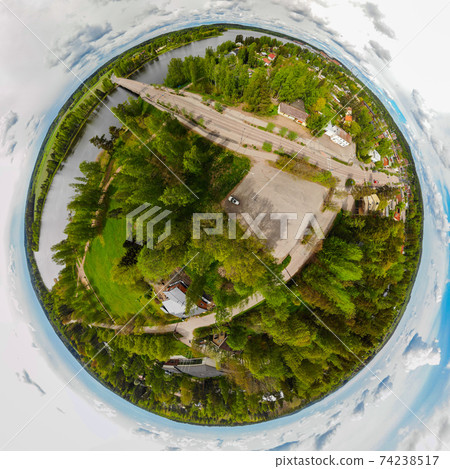 A three dimensional aerial panoramic view of city Inkeroinen at river Kymijoki, Finland. A three dimensional aerial panoramic view of city Inkeroinen at river Kymijoki, Finland. 74238517