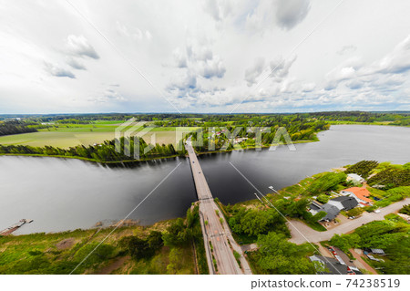 Aerial panoramic view of bridge in city Inkeroinen at river Kymijoki, Finland. Aerial panoramic view of bridge in city Inkeroinen at river Kymijoki, Finland. 74238519