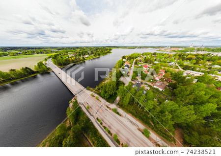 Aerial panoramic view of bridge in city Inkeroinen at river Kymijoki, Finland. Aerial panoramic view of bridge in city Inkeroinen at river Kymijoki, Finland. 74238521
