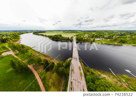 Aerial panoramic view of bridge in city Inkeroinen at river Kymijoki, Finland. Aerial panoramic view of bridge in city Inkeroinen at river Kymijoki, Finland. 74238522