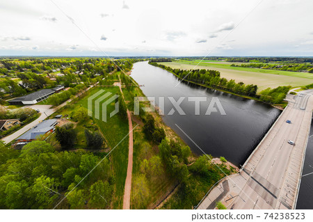 Aerial panoramic view of city Inkeroinen at river Kymijoki, Finland. Aerial panoramic view of city Inkeroinen at river Kymijoki, Finland. 74238523