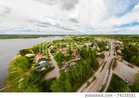 Aerial panoramic view of city Inkeroinen at river Kymijoki, Finland. Aerial panoramic view of city Inkeroinen at river Kymijoki, Finland. 74238581