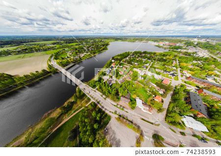 Aerial panoramic view of city Inkeroinen at river Kymijoki, Finland. Aerial panoramic view of city Inkeroinen at river Kymijoki, Finland. 74238593