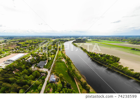 Aerial panoramic view of city Inkeroinen at river Kymijoki, Finland. Aerial panoramic view of city Inkeroinen at river Kymijoki, Finland. 74238599