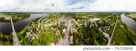 Aerial panoramic view of city Inkeroinen at river Kymijoki, Finland. Aerial panoramic view of city Inkeroinen at river Kymijoki, Finland. 74238606