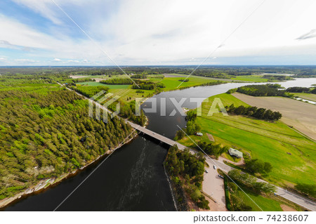 Aerial panoramic view of rapid Susikoski at river Kymijoki, Finland. 74238607