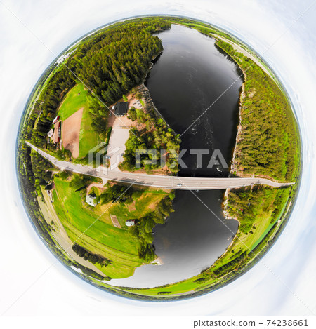 A three dimensional aerial panoramic view of rapid Susikoski at river Kymijoki, Finland, in a mini planet panorama style. A three dimensional aerial panoramic view of rapid Susikoski at river Kymijoki, Finland, in a mini planet panorama style. 74238661
