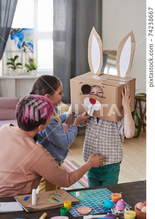 Rabbit costume from cardboard box Rabbit costume from cardboard box 74238667