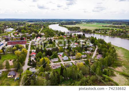 Aerial panoramic view of city Inkeroinen at river Kymijoki, Finland. Aerial panoramic view of city Inkeroinen at river Kymijoki, Finland. 74238682