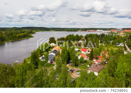 Aerial panoramic view of city Inkeroinen at river Kymijoki, Finland. Aerial panoramic view of city Inkeroinen at river Kymijoki, Finland. 74238691
