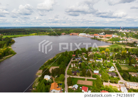 Aerial panoramic view of city Inkeroinen at river Kymijoki, Finland. Aerial panoramic view of city Inkeroinen at river Kymijoki, Finland. 74238697