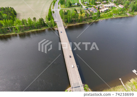 Aerial panoramic view of bridge in city Inkeroinen at river Kymijoki, Finland. Aerial panoramic view of bridge in city Inkeroinen at river Kymijoki, Finland. 74238699