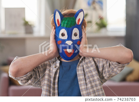 Boy in rabbit mask Boy in rabbit mask 74238703