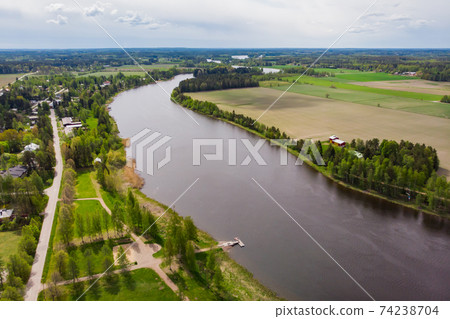 Aerial panoramic view of city Inkeroinen at river Kymijoki, Finland. Aerial panoramic view of city Inkeroinen at river Kymijoki, Finland. 74238704