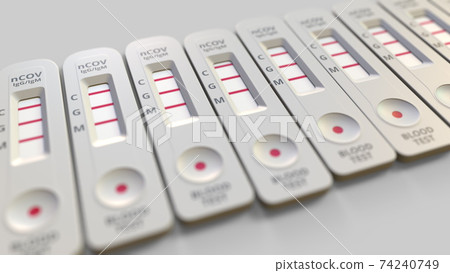 Coronavirus testing devices, multiple positive results, 3d rendering Coronavirus testing devices, multiple positive results, 3d rendering 74240749