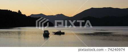 Nightfall in the Marlborough Sounds, New Zealand. Nightfall in the Marlborough Sounds, New Zealand. 74240974
