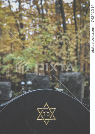 six pointed star or hexagram on tombstone. Autumn jewish Cemetery six pointed star or hexagram on tombstone. Autumn jewish Cemetery 74241514
