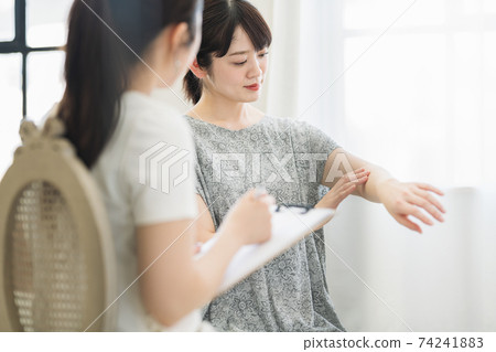 Women receiving treatment counseling Women receiving treatment counseling 74241883