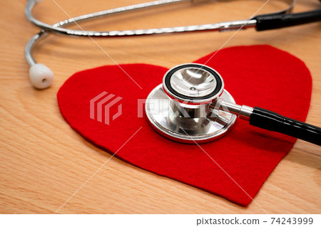 Stethoscope and heart symbol 74243999