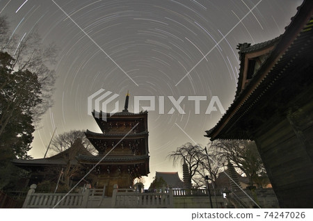 Trails of stars in the city (with the three-storied pagoda in the foreground) Trails of stars in the city (with the three-storied pagoda in the foreground) 74247026