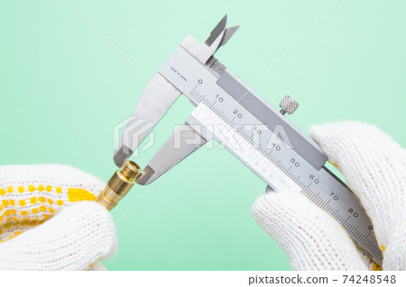 Measurement inspection Inspection work Quality control image 74248548