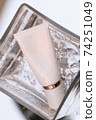 Cosmetic bottle in a bowl with water mininmalist beauty 74251049