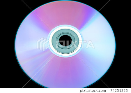 CD disc black background CD disc black background 74251235