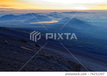 Mountain range at dawn and Lake Yamanaka seen from Mt. Fuji and Mt. Hoei 74252207