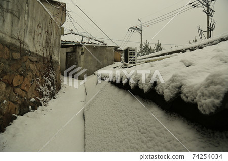 Jeongneunggol. Jangdokdae. Snow scene. Alley Jeongneunggol. Jangdokdae. Snow scene. Alley 74254034