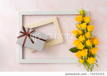 Yellow roses and frame and gift box 74255433