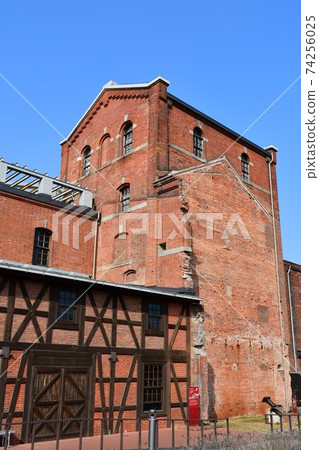 Handa red block building in winter Handa red block building in winter 74256025