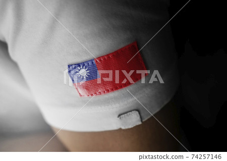 Patch of the national flag of the Taiwan on a white t-shirt Patch of the national flag of the Taiwan on a white t-shirt 74257146